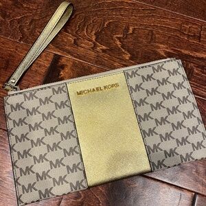 Michael Kors gold wristlet